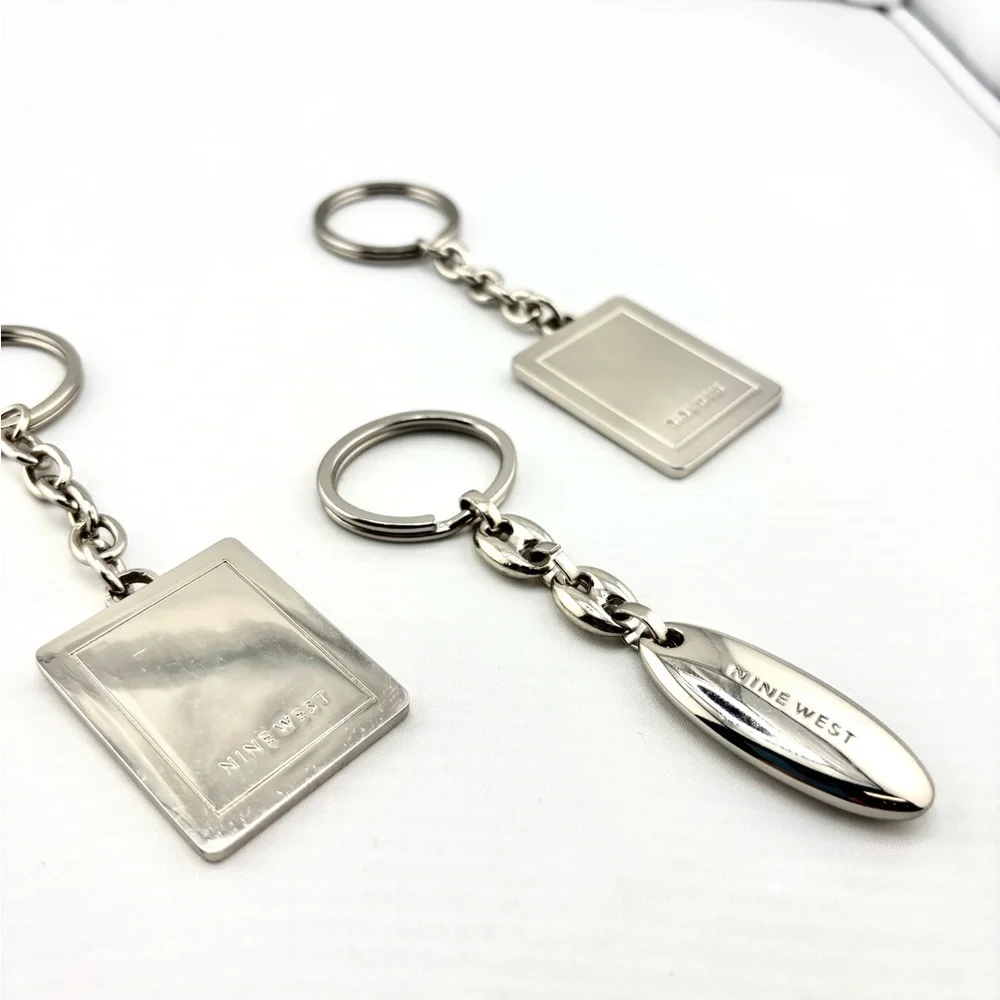 Nine West Silver Tone Logo Keychain Bundle - Lot of 3